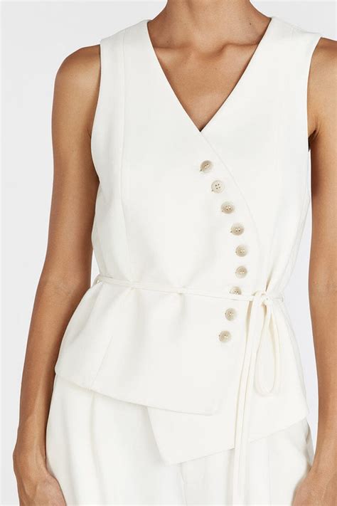 CELINE CREAM ASYMMETRICAL TOP .